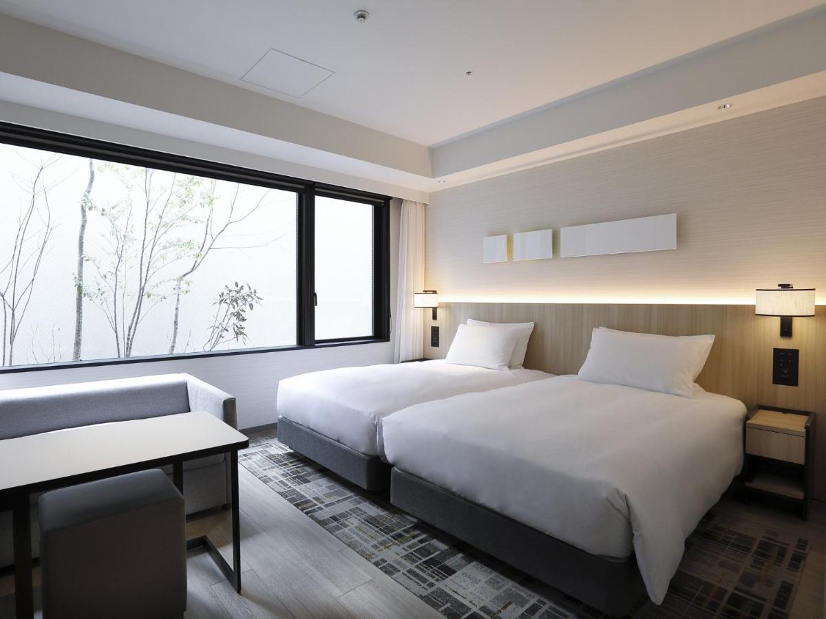Twin Room Bathtub Garden View,1391838176:JPEG