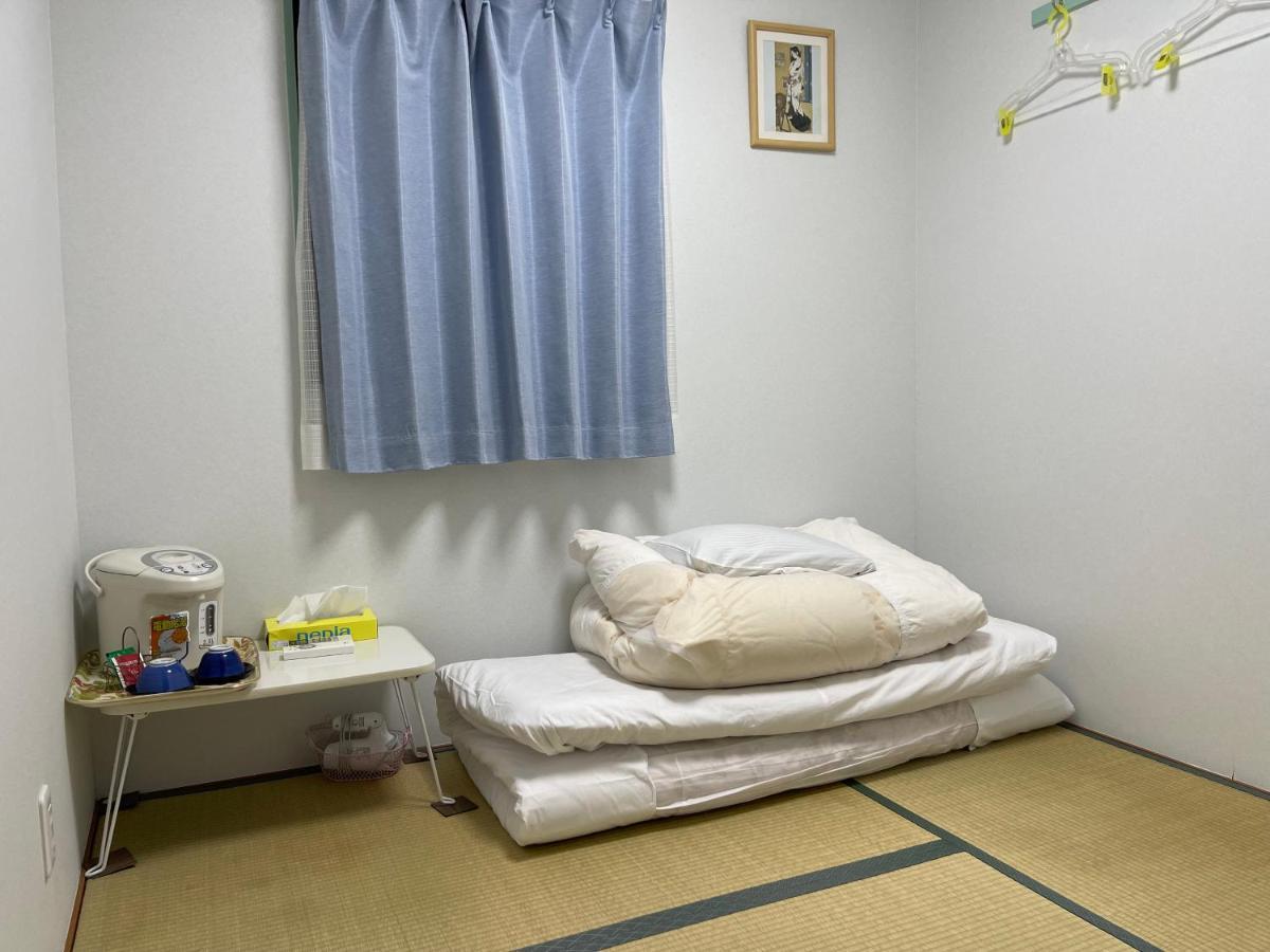 Single Room with Shared Shower and Toilet