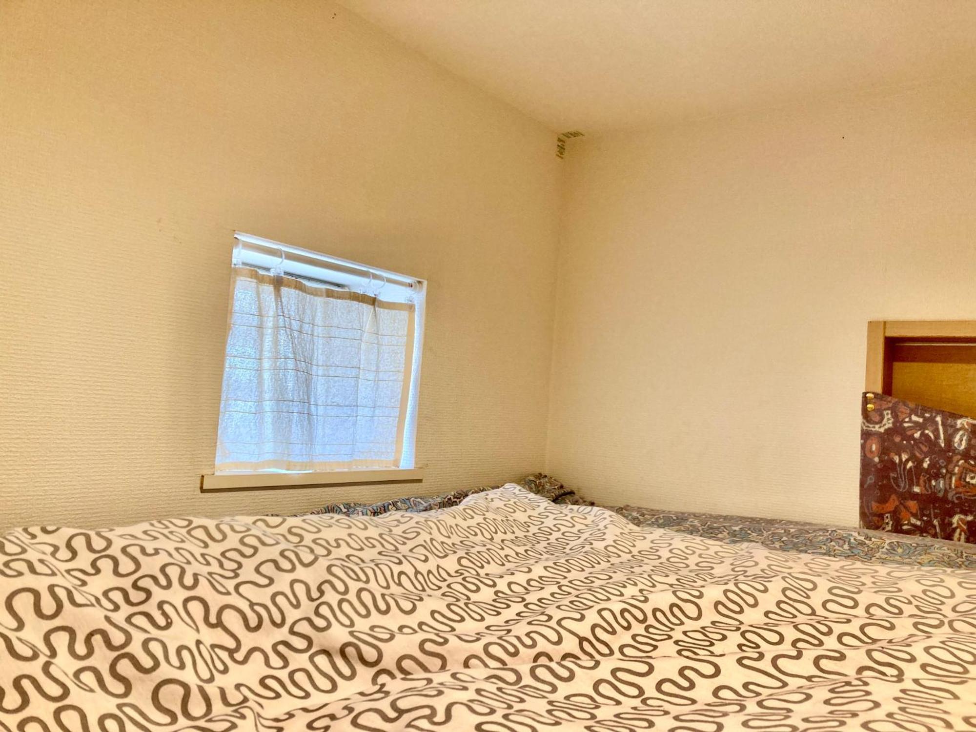 Single Room with Shared Shower and Toilet