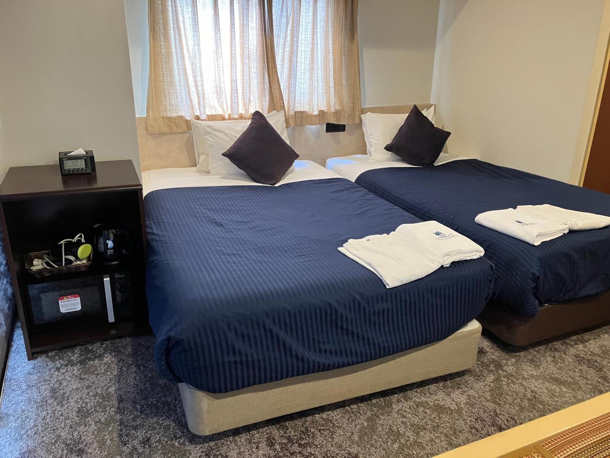 Habitación Doble para no fumadores con zona de tatami - 2 camas