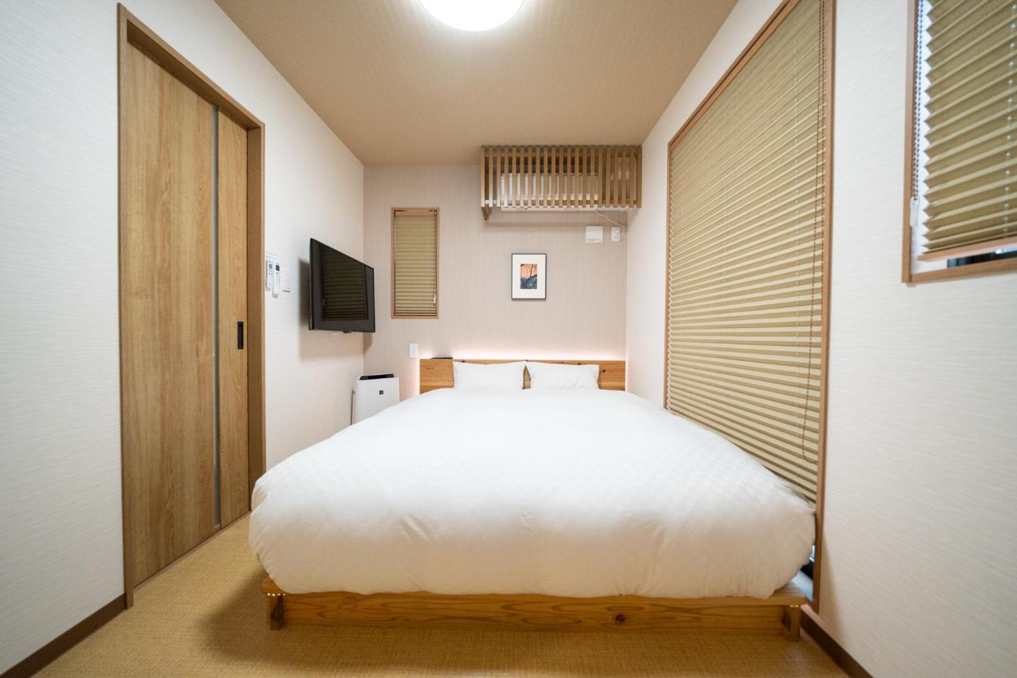 Kamer met Queensize Bed en Balkon