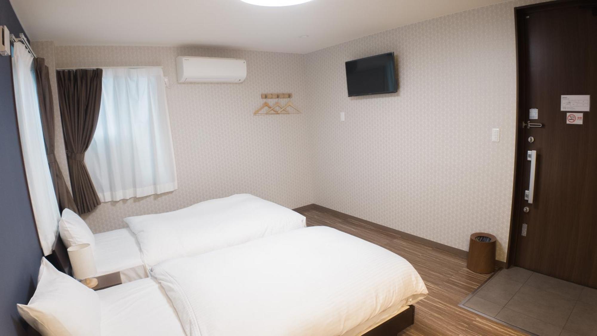 Deluxe Zweibettzimmer
