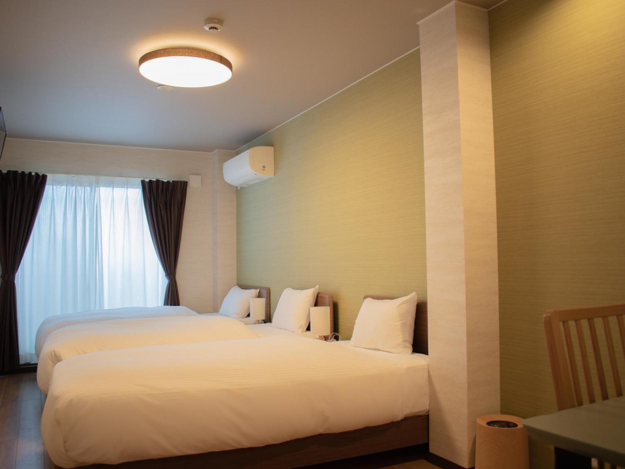 Dreibettzimmer