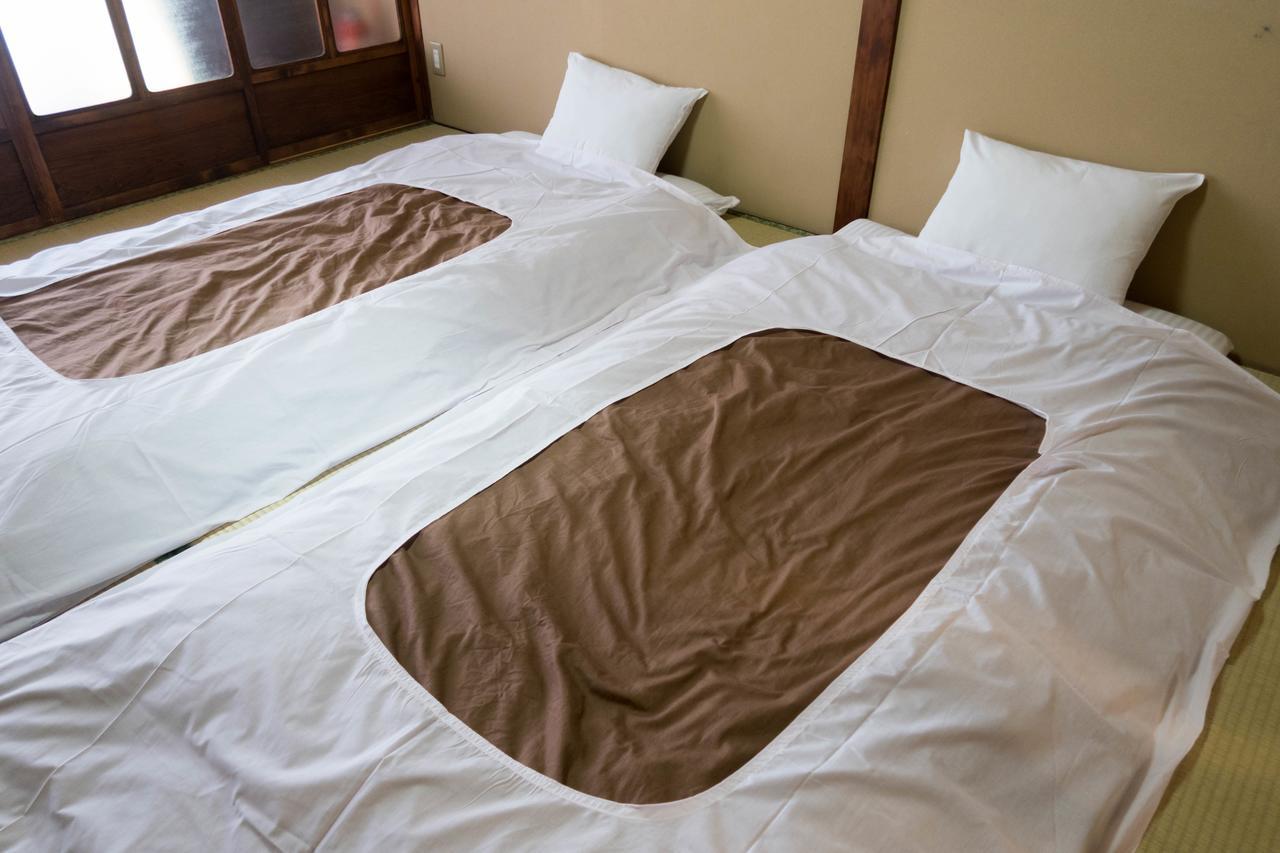 Dreibettzimmer mit Gemeinschaftsbad