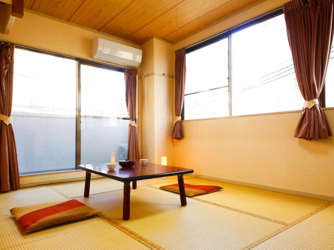 Quadruple Room with Private Bathroom