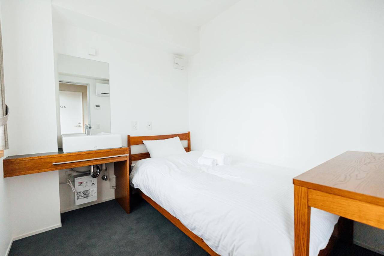Single Room with Shared Shower and Toilet